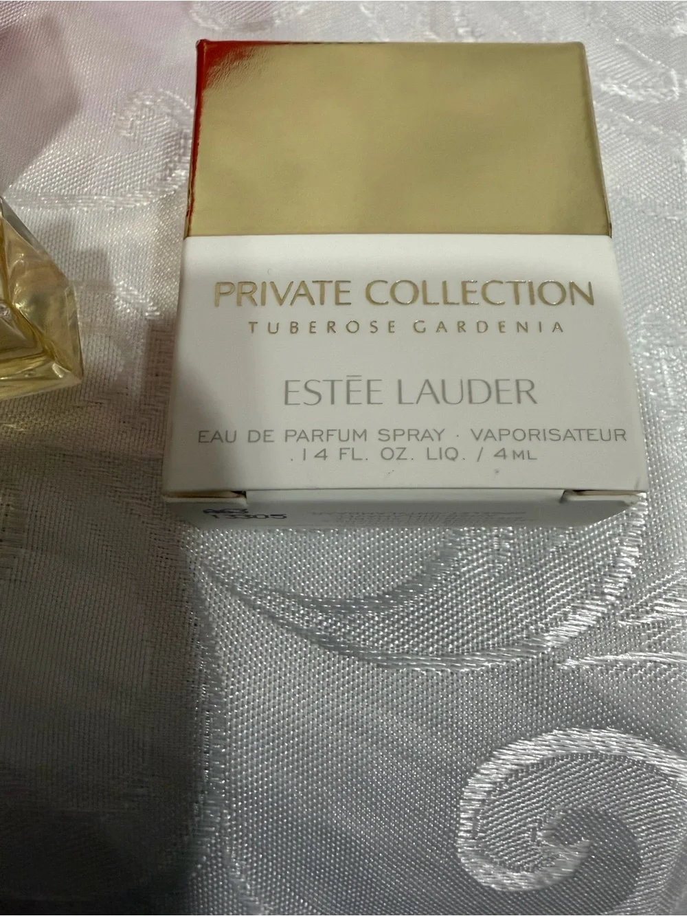 Estee Lauder Red Tassel Cosmetic Pouch & (3 )0.14 oz Tuberose Gardenia Parfum